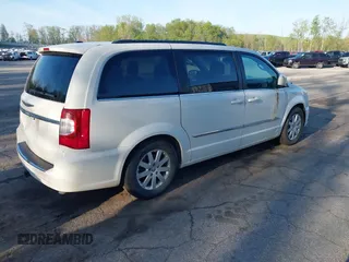 2013 Chrysler Town & Country Touring with VIN 2C4RC1BG6DR540964, listed as a IAAI auction lot 42215779 with 218,141 mi miles and . Bid and sale history available at DreamBid. Image 4.