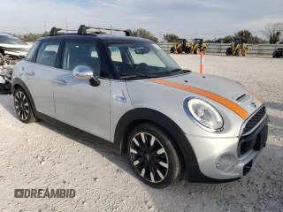 2015 MINI Cooper Hardtop 4 Door S with VIN WMWXU3C50F2B65944, listed as a Copart auction lot 82986174 with 121,207 mi miles and Clean Title. Bid and sale history available at carsss.com. Image 4.