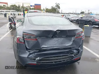 2022 Tesla Model S with VIN 5YJSA1E52NF459460, listed as a IAAI auction lot 41736236 with Not Provided miles and . Bid and sale history available at DreamBid. Image 6.