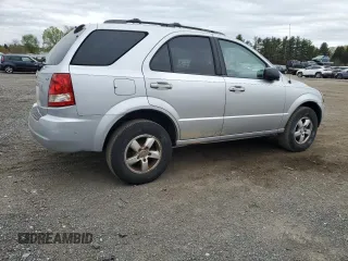2006 Kia Sorento LX with VIN KNDJD733265522597, listed as a Copart auction lot 53667805 with 97,823 mi miles and Salvage Title. Bid and sale history available at DreamBid. Image 3.