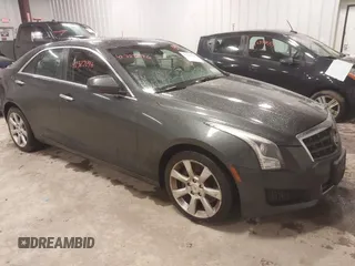 2014 Cadillac ATS Standard AWD z VIN 1G6AG5RX8E0174762, wystawiony jako IAAI lot #42323296 z przebiegiem 107 213 mil mil oraz . Historia ofert i sprzedaży dostępna na DreamBid. Obrazek 1.