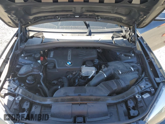 2013 BMW X1 xDrive28i z VIN WBAVL1C5XDVR89392, wystawiony jako Copart lot #55699185 z przebiegiem 127 856 mil mil oraz Czysty tytuł • Clean title. Historia ofert i sprzedaży dostępna na DreamBid. Obrazek 12.
