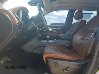 2015 Jeep Grand Cherokee Summit with VIN 1C4RJFJG6FC828922, listed as a Copart auction lot 54878415 with 125,781 mi miles and Salvage title. Bid and sale history available at DreamBid. Image 7.