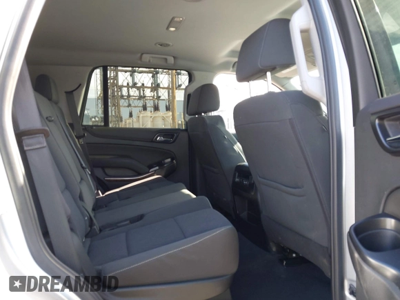 2020 Chevrolet Tahoe LS with VIN 1GNSCAKC2LR227856, listed as a IAAI auction lot 42246510 with 55,132 mi miles and . Bid and sale history available at DreamBid. Image 8.