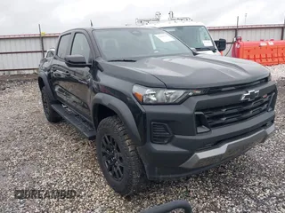 2024 Chevrolet Colorado 4WD Trail Boss with VIN 1GCPTEEK9R1310474, listed as a IAAI auction lot 42114233 with 4,970 mi miles and . Bid and sale history available at DreamBid. Image 1.