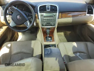 2008 Cadillac SRX RWD z VIN 1GYEE637080130238, wystawiony jako Copart lot #45299765 z przebiegiem 150 684 mil mil oraz Szkoda całkowita • Salvage title. Historia ofert i sprzedaży dostępna na DreamBid. Obrazek 8.