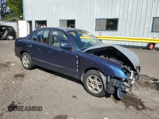 2001 Daewoo Nubira CDX z VIN KLAJB52Z31K647237, wystawiony jako Copart lot #69299834 z przebiegiem 51 513 mil mil oraz Szkody całkowita. Historia ofert i sprzedaży dostępna na DreamBid. Obrazek 4.