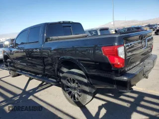 2017 Nissan Titan XD SV with VIN 1N6BA1F43HN567580, listed as a Copart auction lot 72769034 with 97,850 mi miles and Salvage Title. Bid and sale history available at carsss.com. Image 2.