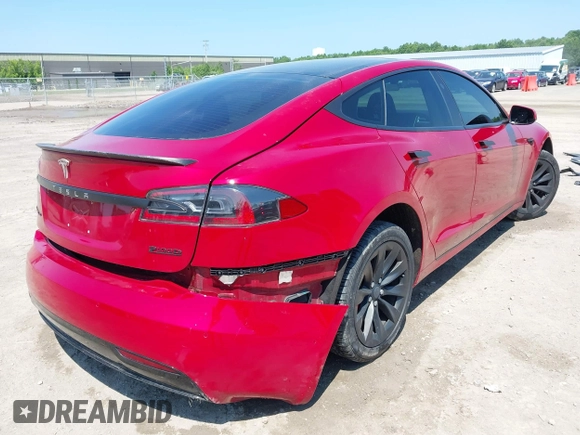 2017 Tesla Model S 100D with VIN 5YJSA1E46HF183568, listed as a IAAI auction lot 42626561 with 110,606 mi miles and . Bid and sale history available at DreamBid. Image 4.
