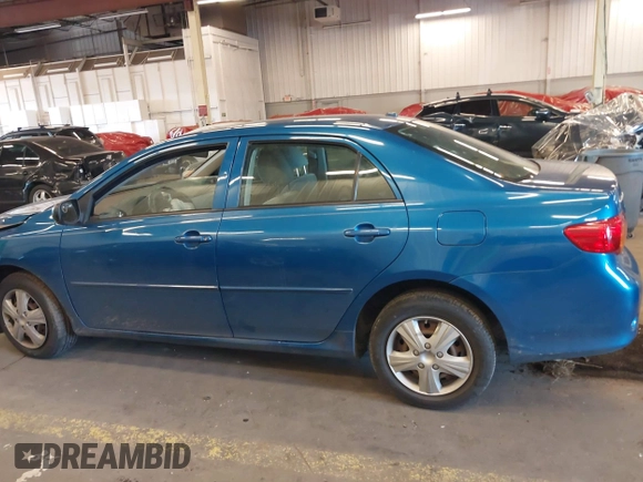2009 Toyota Corolla with VIN 1NXBU40E19Z027256, listed as a IAAI auction lot 41383298 with 221,545 mi miles. Bid and sale history available at carsss.com. Image 14.
