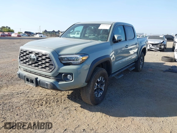 2022 Toyota Tacoma SR with VIN 3TMCZ5AN7NM501028, listed as a IAAI auction lot 42537868 with 42,186 mi miles and . Bid and sale history available at DreamBid. Image 2.