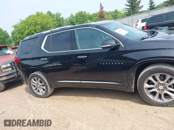 2019 Chevrolet Traverse Premier with VIN 1GNEVKKW1KJ282531, listed as a IAAI auction lot 42408361 with 95,464 mi miles and . Bid and sale history available at DreamBid. Image 13.
