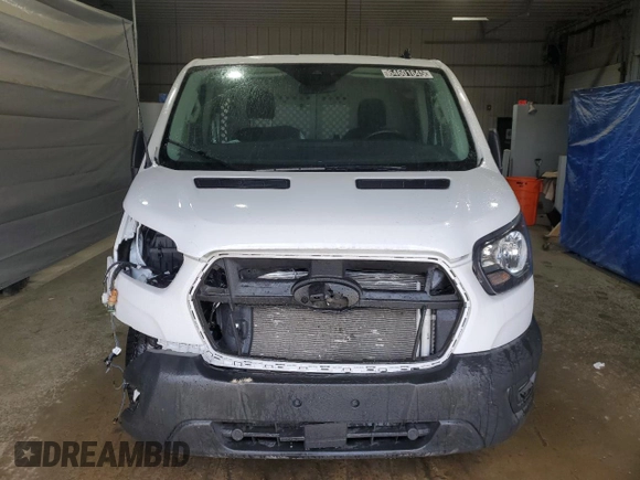 2023 Ford Transit Cargo z VIN 1FTBR1Y82PKB80689, wystawiony jako Copart lot #64601645 z przebiegiem 14 074 mil mil oraz Czysty tytuł • Clean title. Historia ofert i sprzedaży dostępna na DreamBid. Obrazek 5.