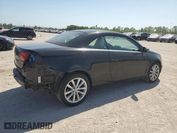 2012 Volkswagen Eos Komfort с VIN WVWBW7AH7CV007183, выставлен на аукционе Copart как лот 52561265 с пробегом 126 262 миль миль и Списание • Salvage title. История ставок и продаж доступна на DreamBid. Изображение 3.