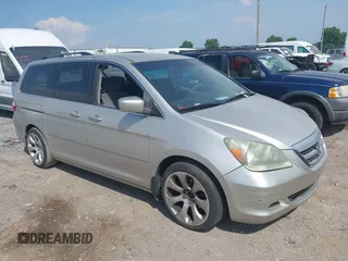 2006 Honda Odyssey EX with VIN 5FNRL38486B411499, listed as a IAAI auction lot 42603851 with 211,964 mi miles and . Bid and sale history available at DreamBid. Image 1.