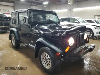 1998 Jeep Wrangler SE with VIN 1J4FY29P2WP711675, listed as a Copart auction lot 50790335 with 163,928 mi miles and Salvage Title. Bid and sale history available at carsss.com. Image 4.