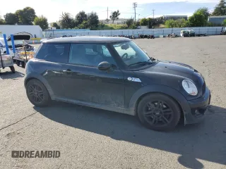 2012 MINI Hardtop S with VIN WMWSV3C54CT386098, listed as a Copart auction lot 52742075 with 119,432 mi miles and Salvage Title. Bid and sale history available at DreamBid. Image 4.