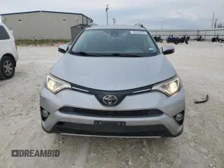 2018 Toyota RAV4 XLE with VIN JTMWFREV3JJ180152, listed as a Copart auction lot 46949465 with 103,346 mi miles and Clean Title. Bid and sale history available at DreamBid. Image 5.