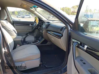 2011 Kia Sorento LX with VIN 5XYKT3A1XBG011576, listed as a IAAI auction lot 42062990 with 227,954 mi miles. Bid and sale history available at carsss.com. Image 5.