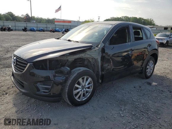 2016 Mazda CX-5 Sport with VIN JM3KE4BY6G0749973, listed as a Copart auction lot 54131635 with 97,480 mi miles and Salvage title. Bid and sale history available at DreamBid. Image 1.
