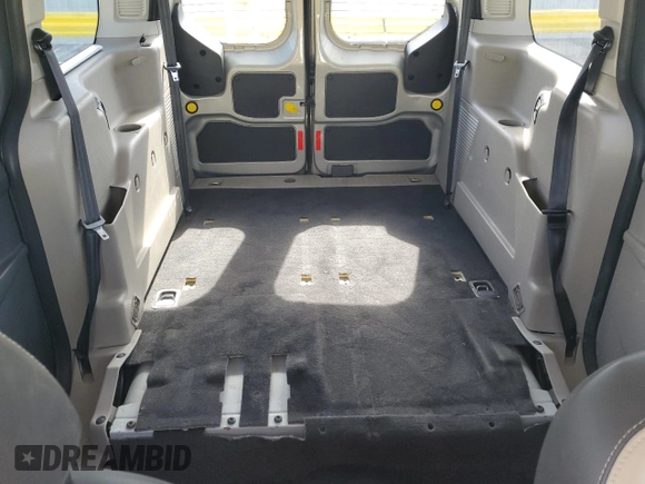 2015 Ford Transit Connect XLT with VIN NM0GS9F77F1185066, listed as a Copart auction lot 52049115 with 85,359 mi miles and Salvage title. Bid and sale history available at DreamBid. Image 10.