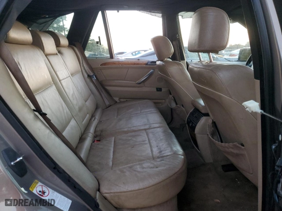 2004 BMW X5 4.4i with VIN 5UXFB53594LV02646, listed as a Copart auction lot 83036934 with 180,810 mi miles and Salvage Title. Bid and sale history available at carsss.com. Image 12.