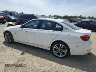 2018 BMW 3 Series 330i xDrive with VIN WBA8D9G56JNU71570, listed as a Copart auction lot 54071565 with 73,305 mi miles and Salvage title. Bid and sale history available at DreamBid. Image 2.