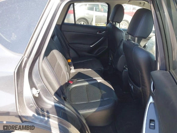 2016 Mazda CX-5 Grand Touring with VIN JM3KE4DY5G0837958, listed as a IAAI auction lot 41713313 with NaN miles. Bid and sale history available at carsss.com. Image 8.