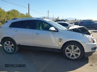 2013 Cadillac SRX Performance Collection with VIN 3GYFNDE37DS599557, listed as a IAAI auction lot 41633569 with 100,611 mi miles and . Bid and sale history available at DreamBid. Image 13.