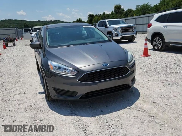 2018 Ford Focus SE with VIN 1FADP3F25JL331038, listed as a Copart auction lot 60235395 with 37,038 mi miles and Salvage title. Bid and sale history available at DreamBid. Image 13.