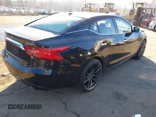 2016 Nissan Maxima SL z VIN 1N4AA6AP7GC395972, wystawiony jako IAAI lot #41357101 z przebiegiem 187 884 mil mil oraz . Historia ofert i sprzedaży dostępna na DreamBid. Obrazek 4.