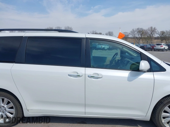 2011 Toyota Sienna XLE with VIN 5TDDK3DC6BS010355, listed as a IAAI auction lot 41998019 with 257,558 mi miles and . Bid and sale history available at DreamBid. Image 14.
