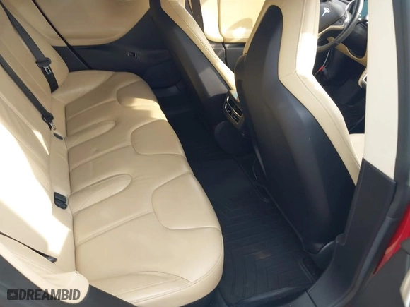 2013 Tesla Model S with VIN 5YJSA1CN9DFP09973, listed as a IAAI auction lot 41657188 with 61,546 mi miles. Bid and sale history available at carsss.com. Image 8.
