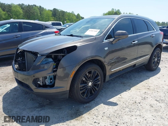 2019 Cadillac XT5 Luxury AWD z VIN 1GYKNDRS9KZ235687, wystawiony jako IAAI lot #41987360 z przebiegiem 78 784 mil mil oraz . Historia ofert i sprzedaży dostępna na DreamBid. Obrazek 21.