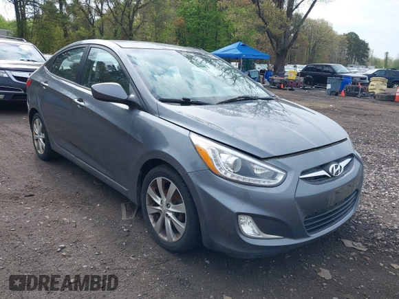 2014 Hyundai Accent GLS with VIN KMHCU4AE9EU761298, listed as a IAAI auction lot 42186032 with 118,848 mi miles and . Bid and sale history available at carsss.com. Image 1.
