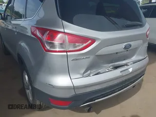 2013 Ford Escape SE with VIN 1FMCU0GX5DUB97293, listed as a IAAI auction lot 42044696 with 182,746 mi miles and . Bid and sale history available at DreamBid. Image 6.