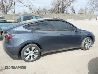 2022 Tesla Model Y Long Range with VIN 7SAYGDEE5NF534259, listed as a IAAI auction lot 41860246 with 24,513 mi miles and . Bid and sale history available at carsss.com. Image 13.