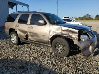 2011 GMC Yukon SLT with VIN 1GKS1CE05BR270876, listed as a Copart auction lot 75906934 with 215,964 mi miles and Salvage Title. Bid and sale history available at carsss.com. Image 4.