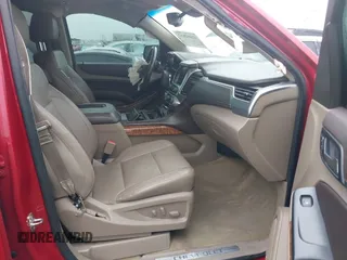 2015 Chevrolet Tahoe LTZ z VIN 1GNSKCKC6FR276531, wystawiony jako IAAI lot #41692617 z przebiegiem 124 010 mil mil oraz . Historia ofert i sprzedaży dostępna na DreamBid. Obrazek 5.