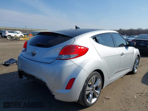 2012 Hyundai Veloster w/Black Int with VIN KMHTC6AD7CU063968, listed as a IAAI auction lot 41764263 with 83,634 mi miles and . Bid and sale history available at DreamBid. Image 4.