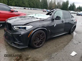 2021 BMW X5 M with VIN 5YMJU0C06M9F14256, listed as a Copart auction lot 86648024 with 0 mi miles and Salvage Title. Bid and sale history available at carsss.com. Image 1.