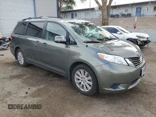 2014 Toyota Sienna LE with VIN 5TDJK3DC4ES085384, listed as a Copart auction lot 60375125 with 81,696 mi miles and Salvage title. Bid and sale history available at DreamBid. Image 4.