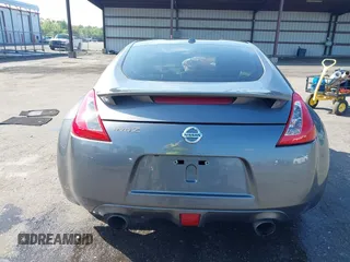 2013 Nissan 370Z with VIN JN1AZ4EH1DM880983, listed as a IAAI auction lot 41937876 with 130,613 mi miles. Bid and sale history available at carsss.com. Image 16.