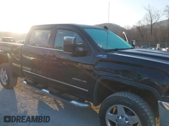 2015 GMC Sierra 2500HD available WiFi SLT with VIN 1GT12ZEG7FF606328, listed as a IAAI auction lot 41793799 with 94,107 mi miles. Bid and sale history available at carsss.com. Image 6.