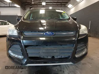 2014 Ford Escape SE with VIN 1FMCU0GX6EUE31877, listed as a IAAI auction lot 42080730 with 71,251 mi miles. Bid and sale history available at carsss.com. Image 12.