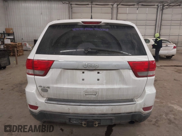 2013 Jeep Grand Cherokee Overland with VIN 1C4RJFCG7DC581808, listed as a IAAI auction lot 41242922 with 187,442 mi miles. Bid and sale history available at carsss.com. Image 17.