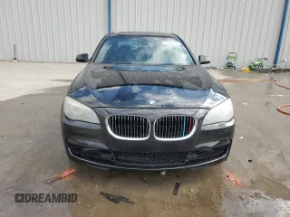 2011 BMW 7 Series 740i with VIN WBAKA4C52BC612977, listed as a Copart auction lot 52582575 with 157,813 mi miles and Salvage Title. Bid and sale history available at carsss.com. Image 5.