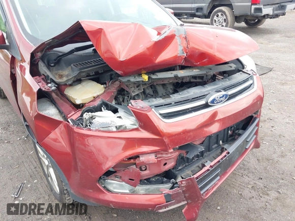 2015 Ford Escape Titanium z VIN 1FMCU9J98FUC84963, wystawiony jako IAAI lot #42469112 z przebiegiem 128 838 mil mil oraz . Historia ofert i sprzedaży dostępna na DreamBid. Obrazek 6.