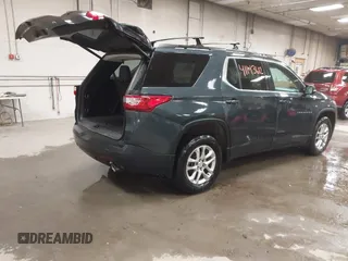 2020 Chevrolet Traverse LT with VIN 1GNEVHKW5LJ203804, listed as a IAAI auction lot 41143612 with 93,947 mi miles and . Bid and sale history available at DreamBid. Image 4.