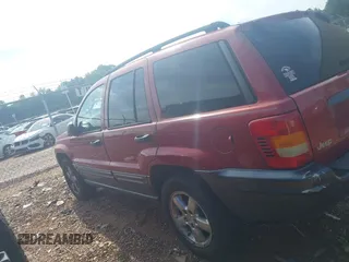 2004 Jeep Grand Cherokee Laredo with VIN 1J4GW48S34C419596, listed as a IAAI auction lot 42515494 with 276,196 mi miles and . Bid and sale history available at DreamBid. Image 14.